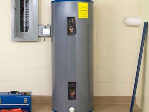 A water heater near an electrical panel in a home