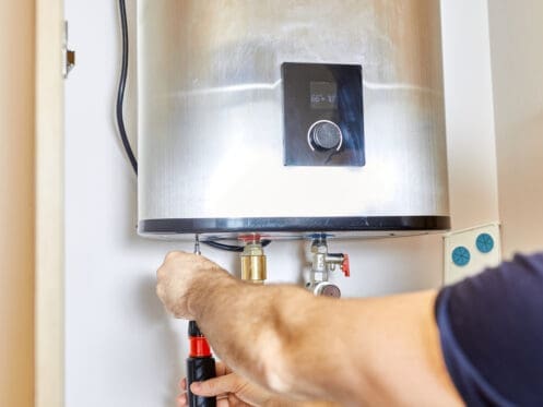 Man Fixing Water Heater